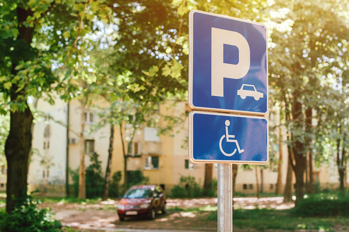Parking spot sign space for people with mobility issues